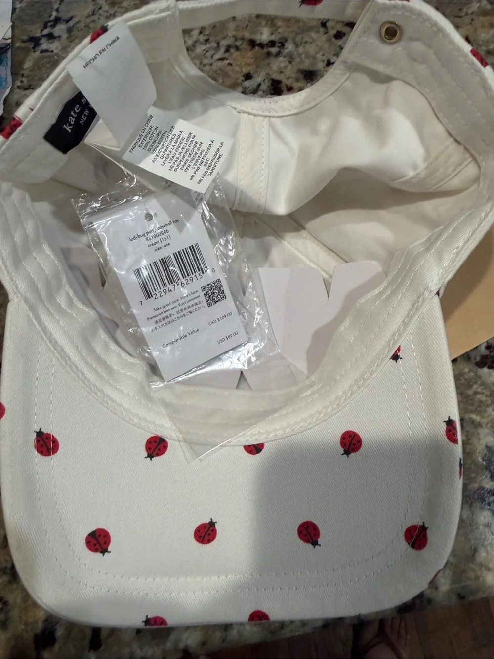 kate spade Cream Baseball Cap with Red Ladybug Print